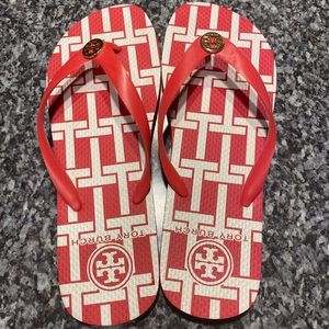 Tory Burch T print Flip Flops Hot Pink